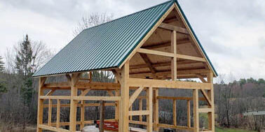Pownal Tractor Barn With Timber Frame by Kennebec Timber Framing